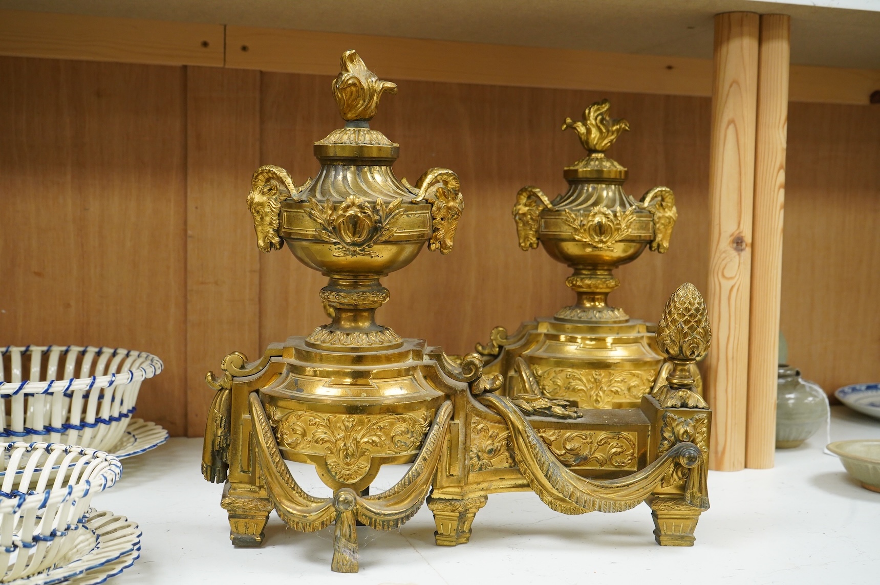 A pair of 19th century French ormolu Chenet. 38cm high x 39cm wide